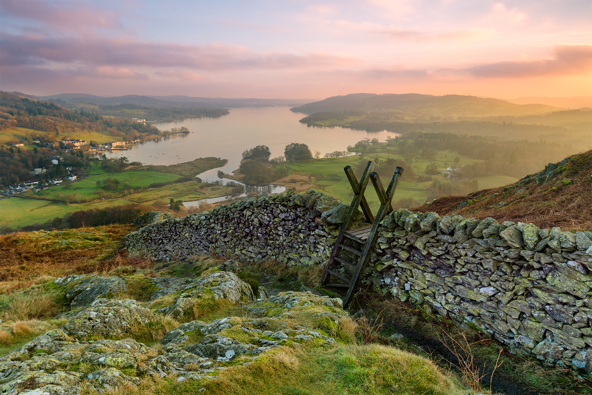 Beautiful sunset over Windermere in the Lake District with a sti